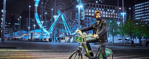 Man sat on bike outside